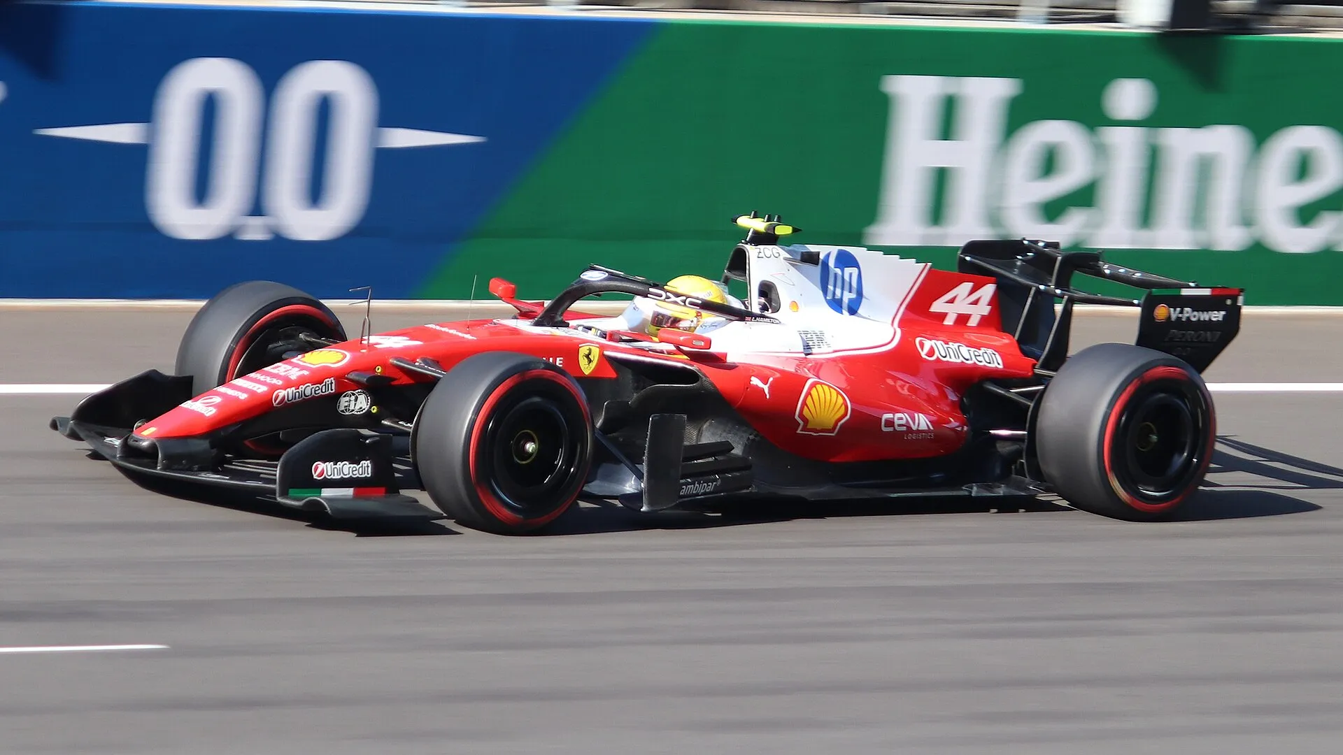 lewis hamilton's red ferrari, number 44, at speed in shanghai