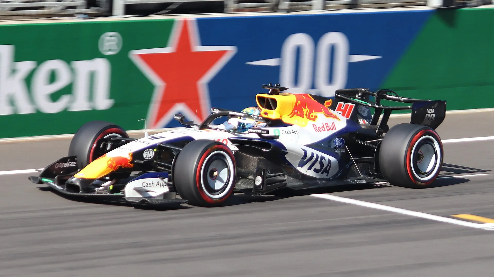 arvid lindblad's racing bulls car at speed in shanghai