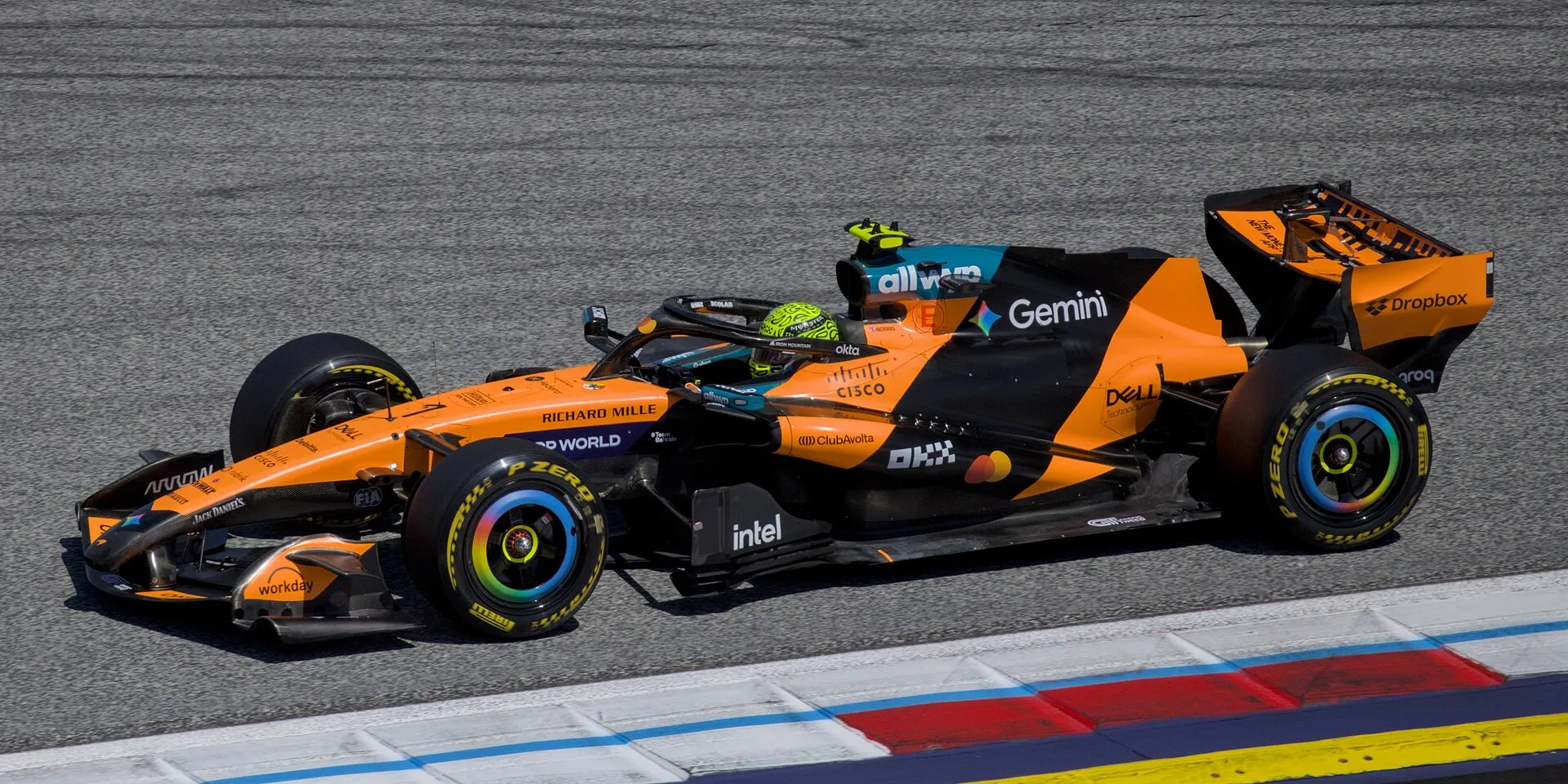 lando norris's orange mclaren side-on at the red bull ring