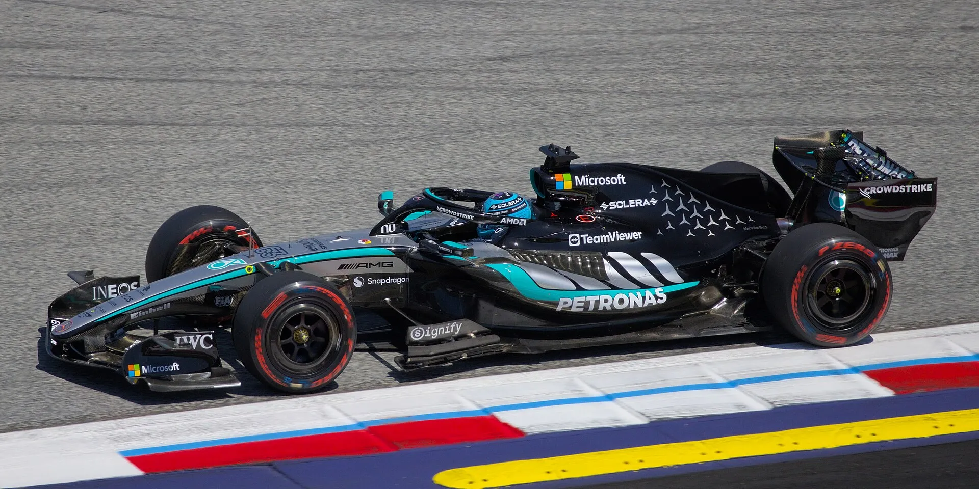 george russell's mercedes side-on next to the kerb at the red bull ring